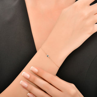 EYE LIGHT GOLD BLUE DIAMOND BRACELET